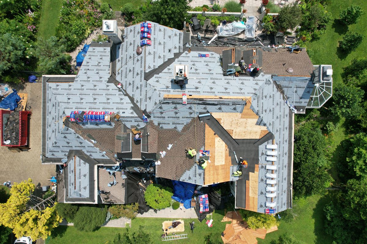 Drone view of the same roof covered in synthetic underlayment and ice-and-water shield